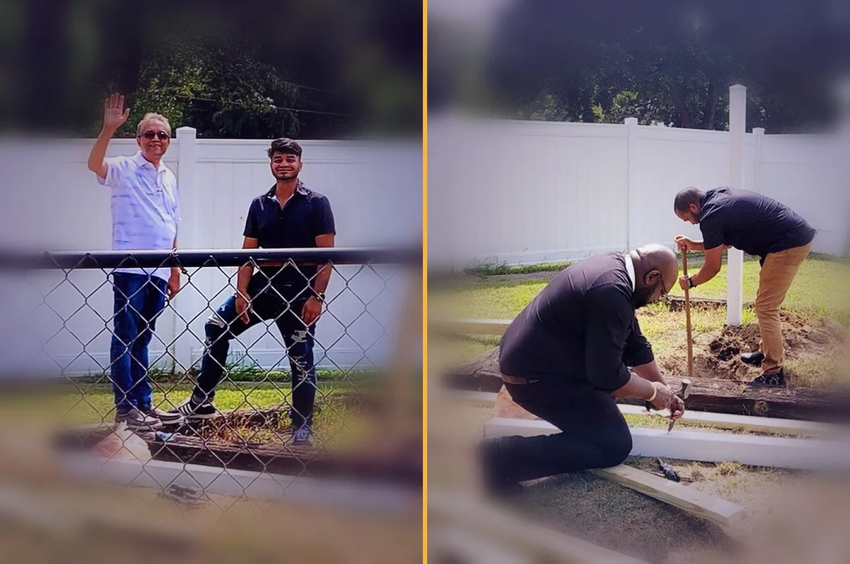 Men of Prayer Tower Church working together on a garden project: two men wave by the fence, and two more dig and measure beside the new beds